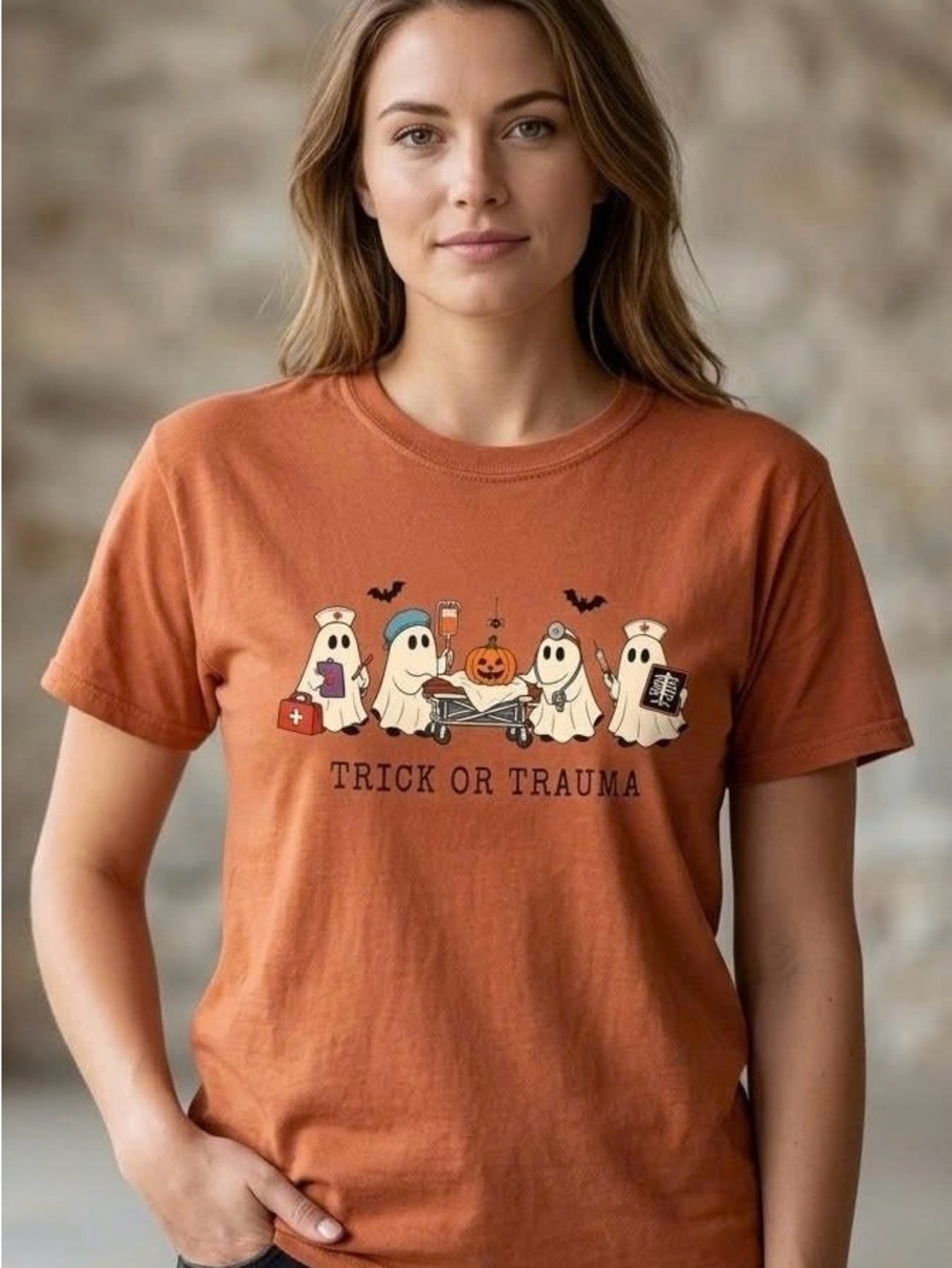 Trick Or Trauma Halloween Shirt Nurse Ghost ER Graphic Tee Burnt Orange